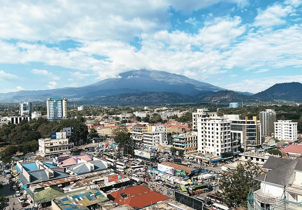 Arusha city view with Mount Meru in the background, taken from a hotel balcony
